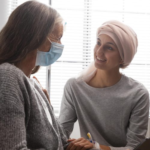 female-patients-talking-hospital-indoors